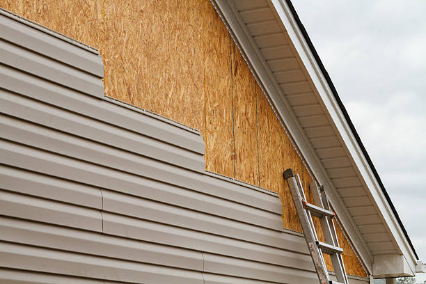 Professional Siding technician working in Plymouth, IN